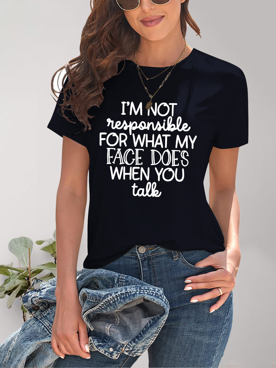 Black round neck T-shirt with letter graphic
