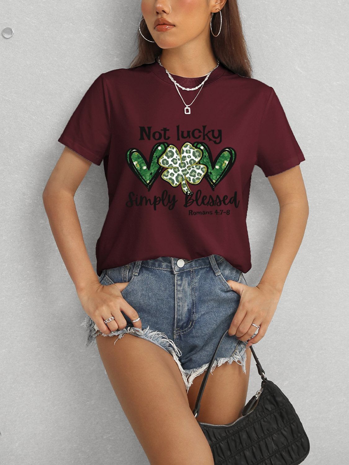 Maroon T-shirt featuring Romans 4:7-8 text