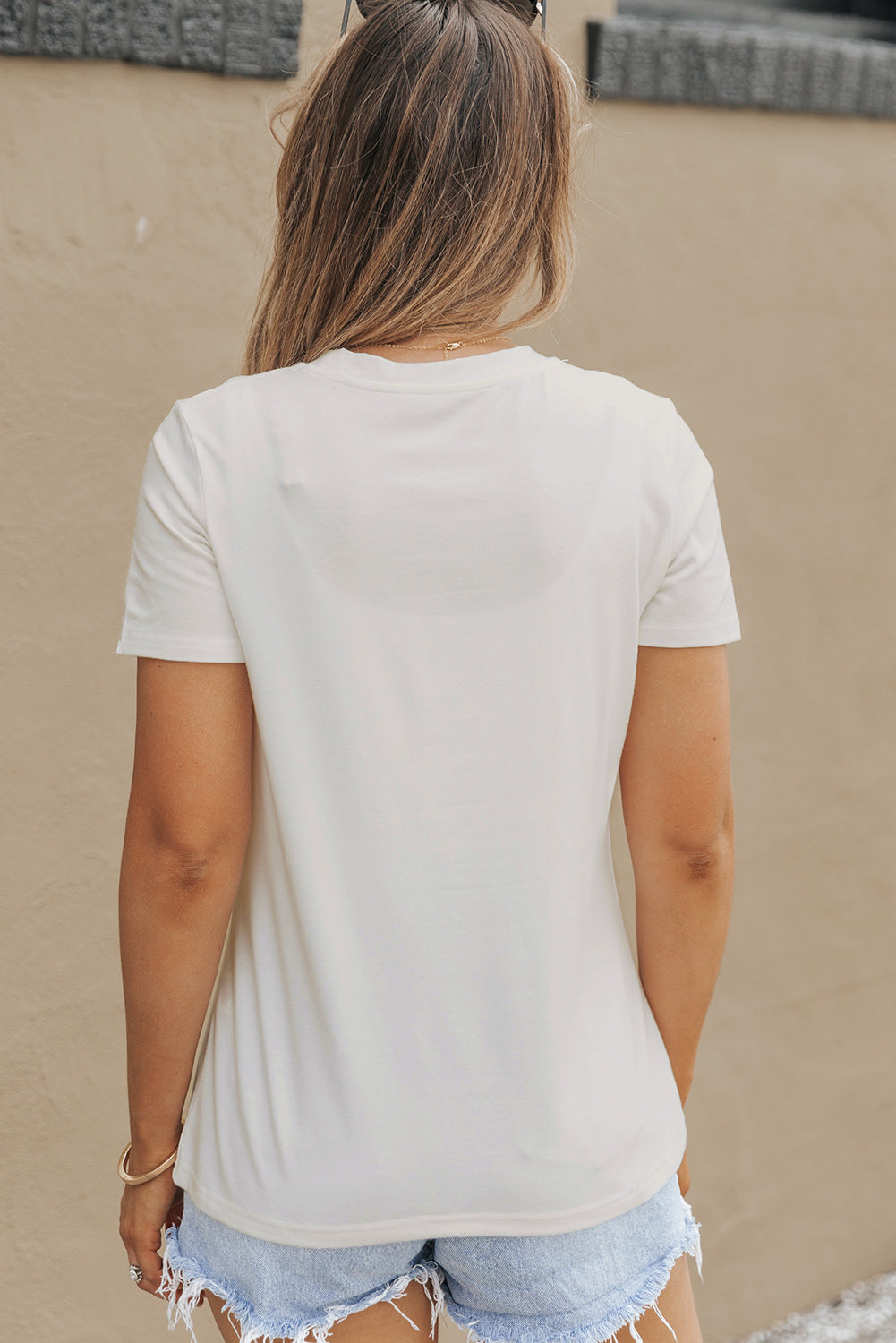 Back view of plain white T-shirt