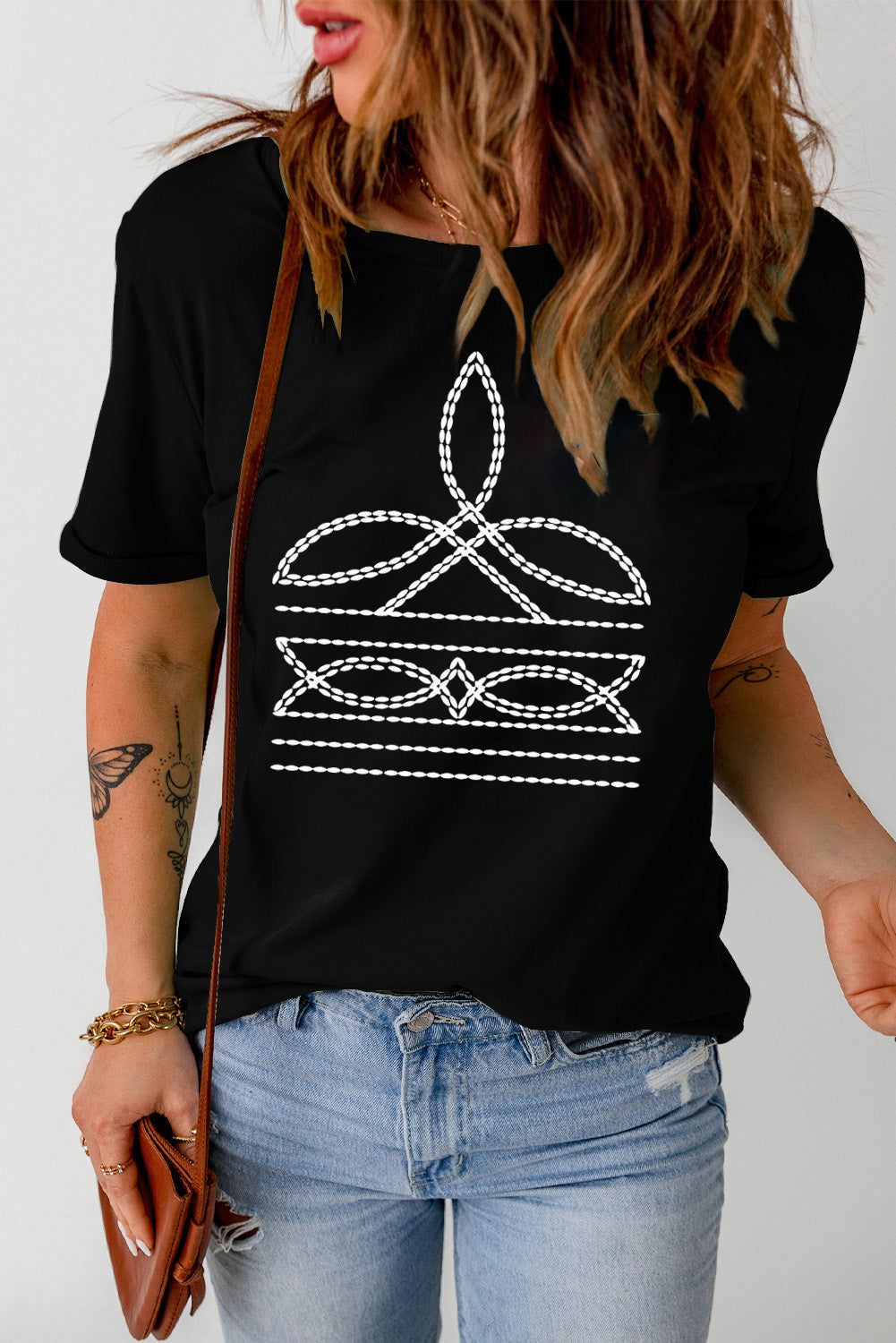 Black graphic round neck short sleeve t-shirt, side view