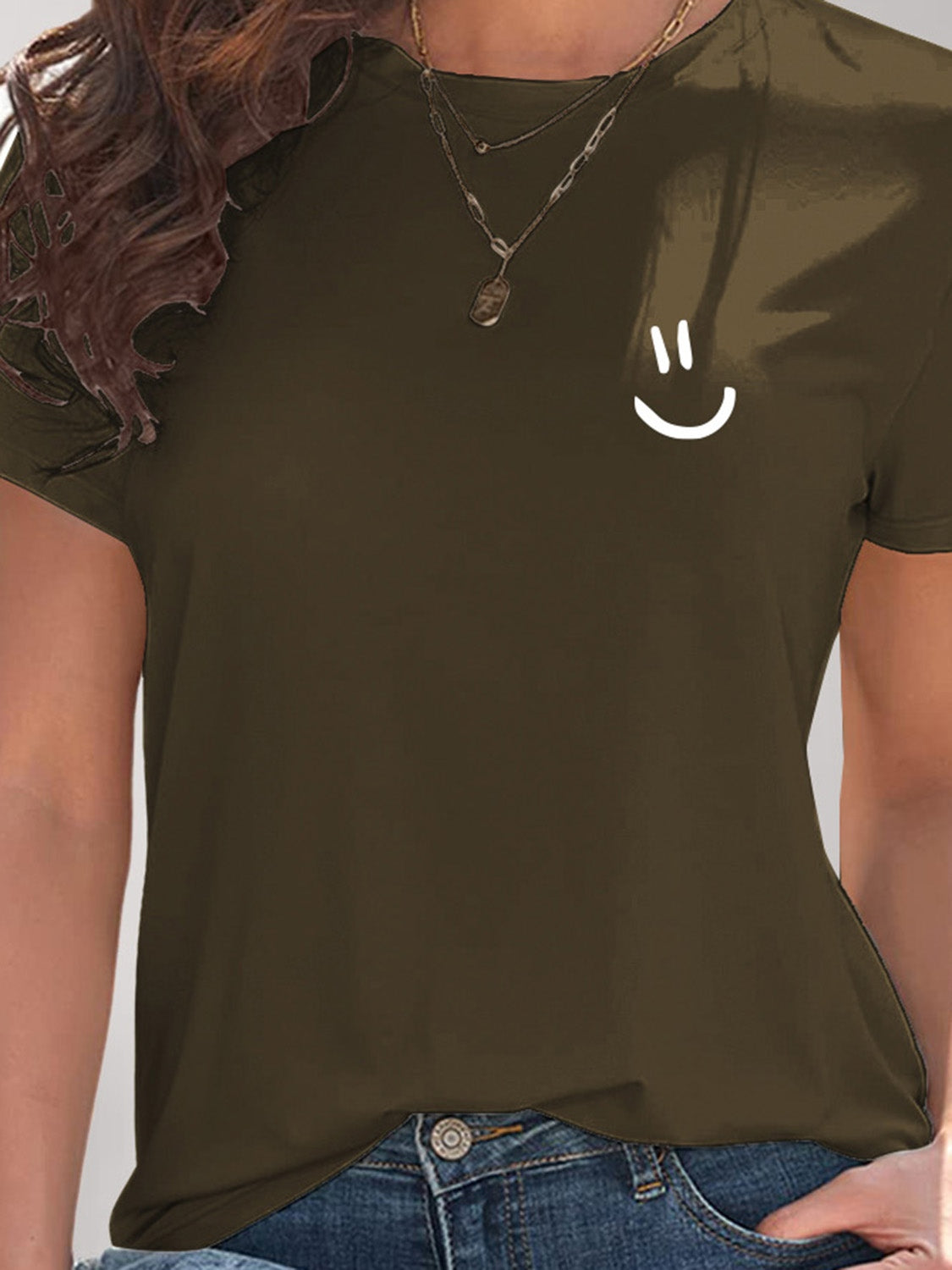 Close-up of brown smile graphic t-shirt