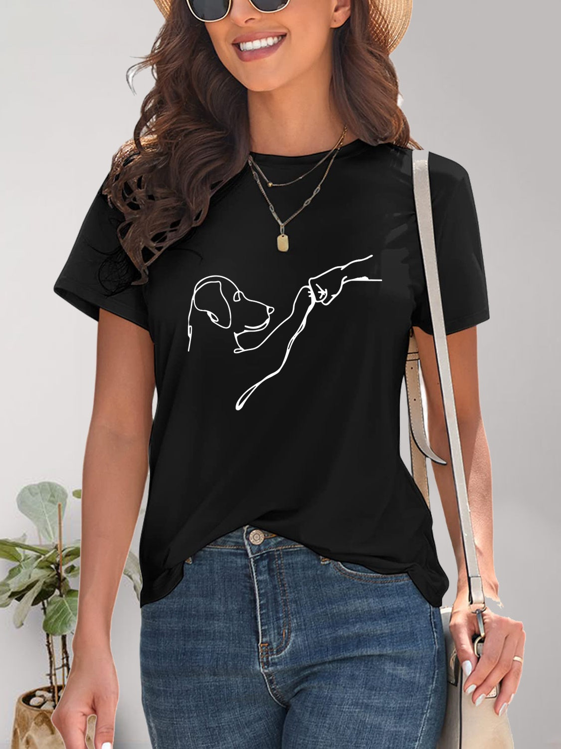 Black dog graphic round neck t-shirt styled with accessories