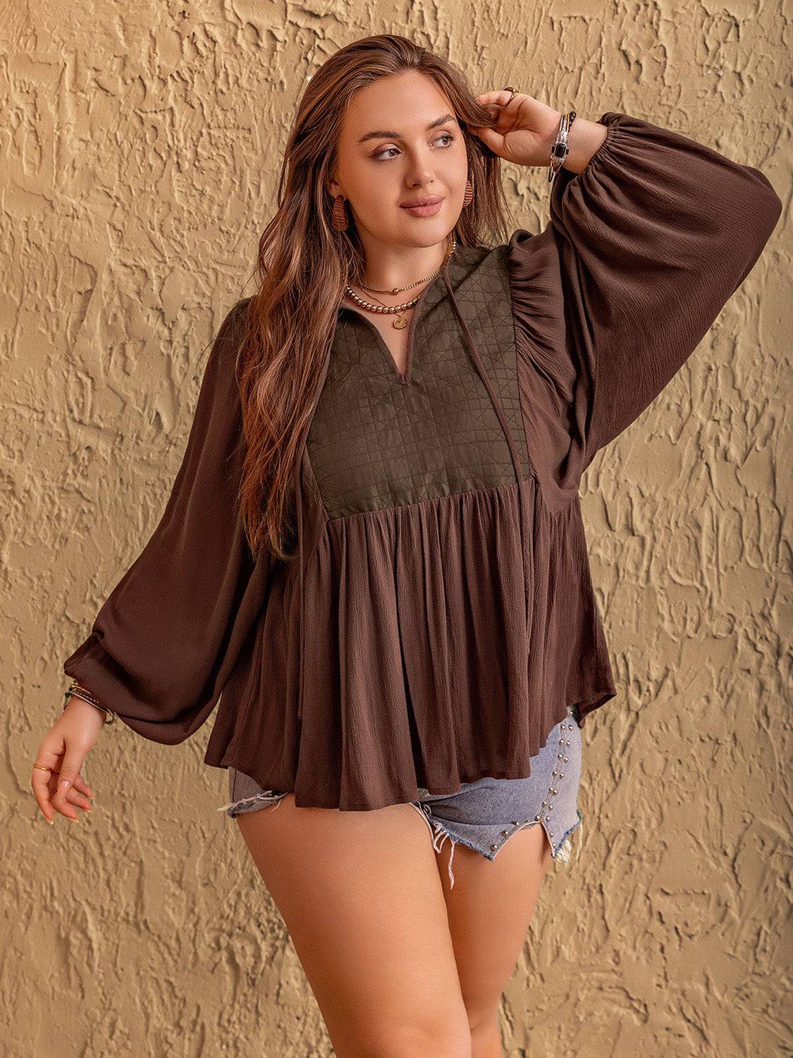 Plus size blouse with tie neck and balloon sleeves, side pose