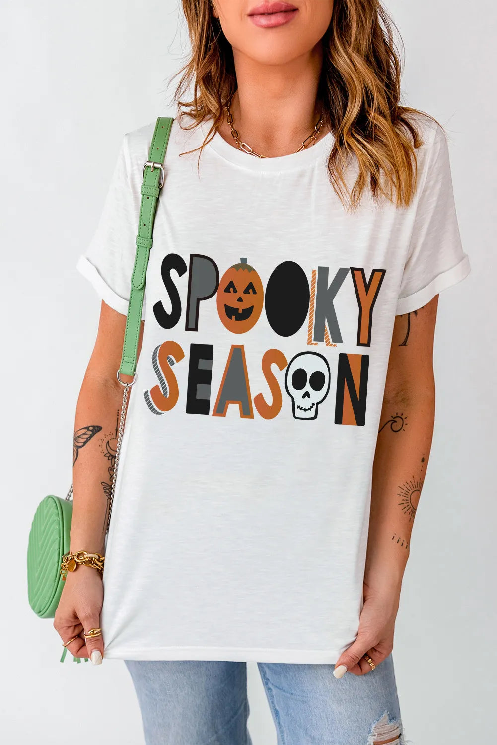 White T-shirt featuring Spooky Season text with Halloween icons.