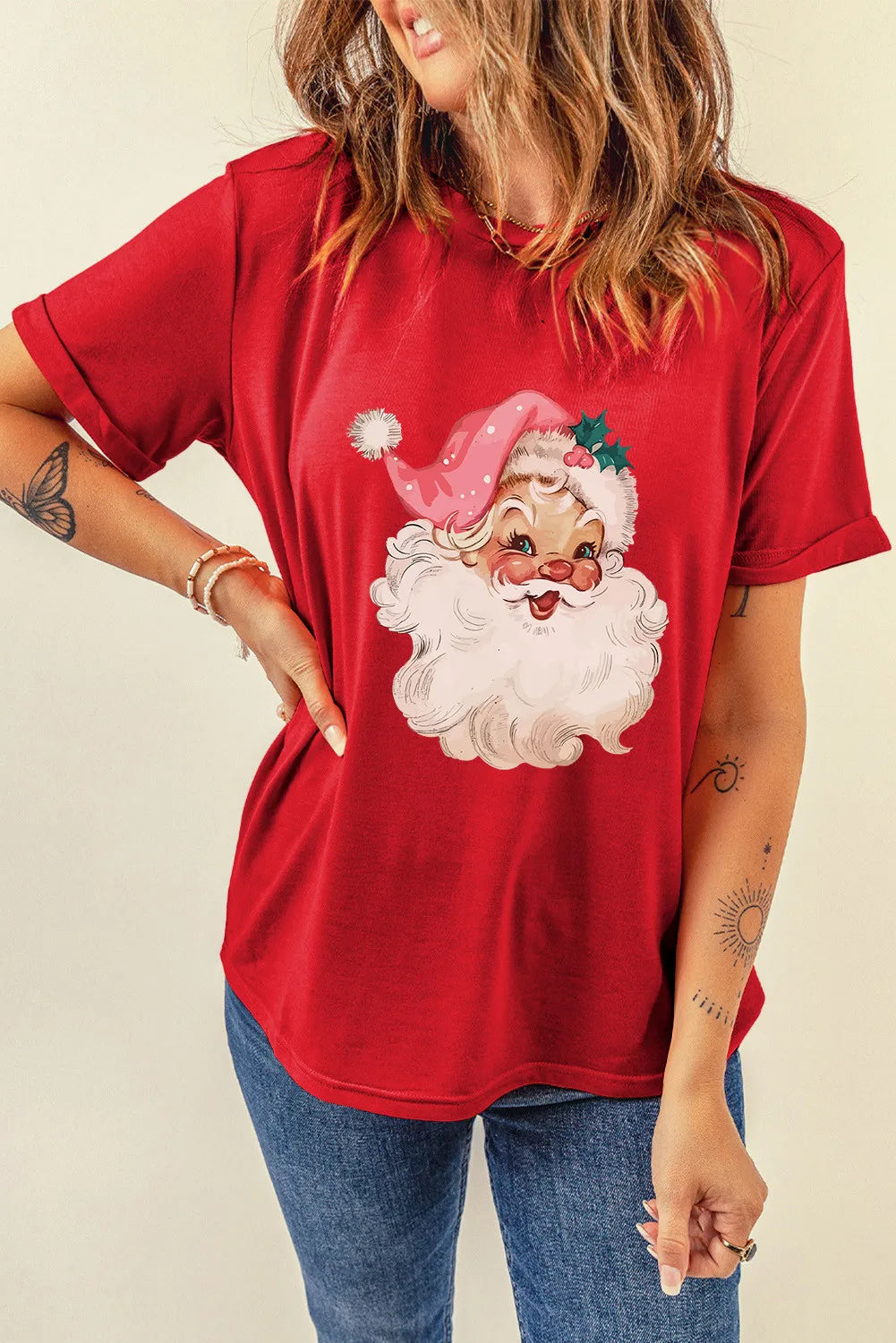 Front view of red t-shirt featuring Santa design.