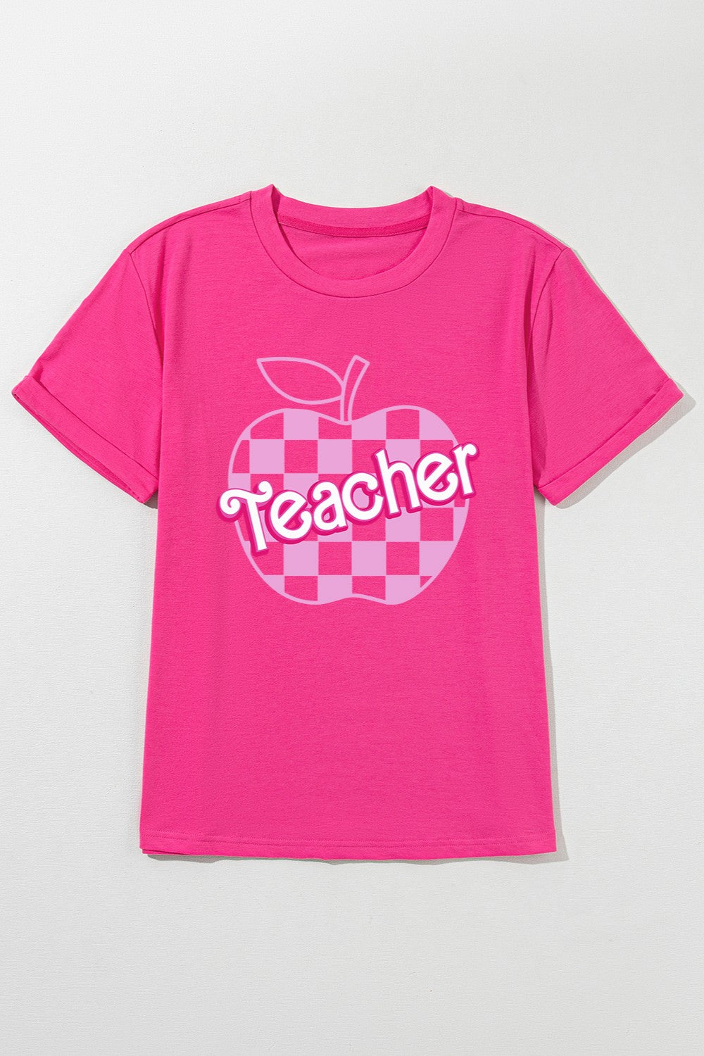 Flat lay of pink T-shirt with &
