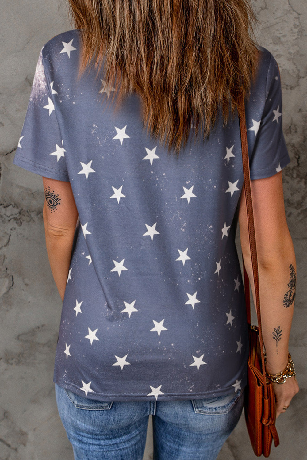 Back view of star-patterned AMERICA T-shirt