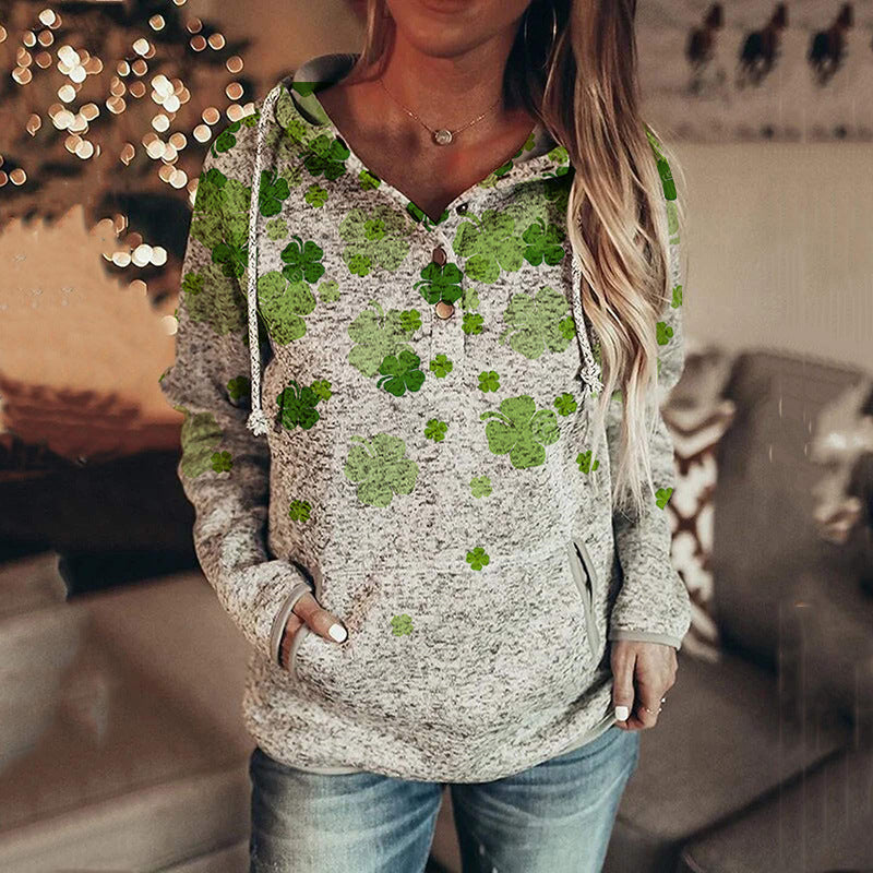 Hooded sweatshirt with green shamrock pattern