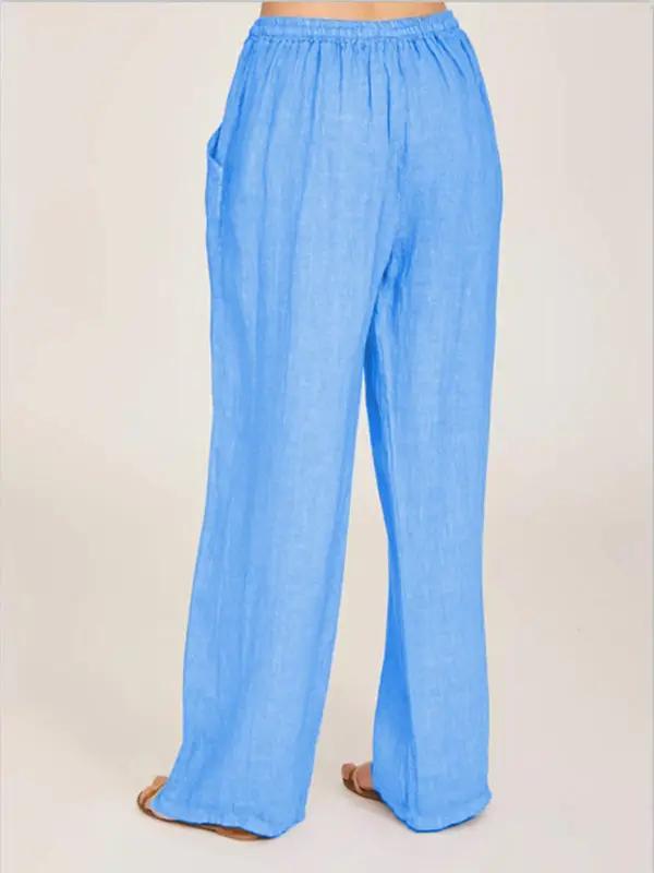 Back view of blue cotton loose pajama pants with pockets