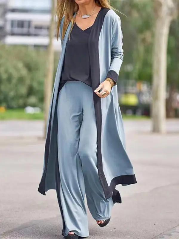Casual three-piece set in blue and black on a model