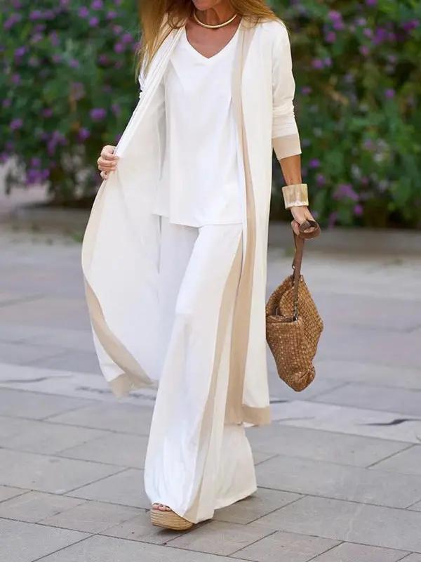 Flowy white and beige three-piece set on a model
