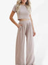 Beige two-piece set with round neck T-shirt and wide-leg trousers