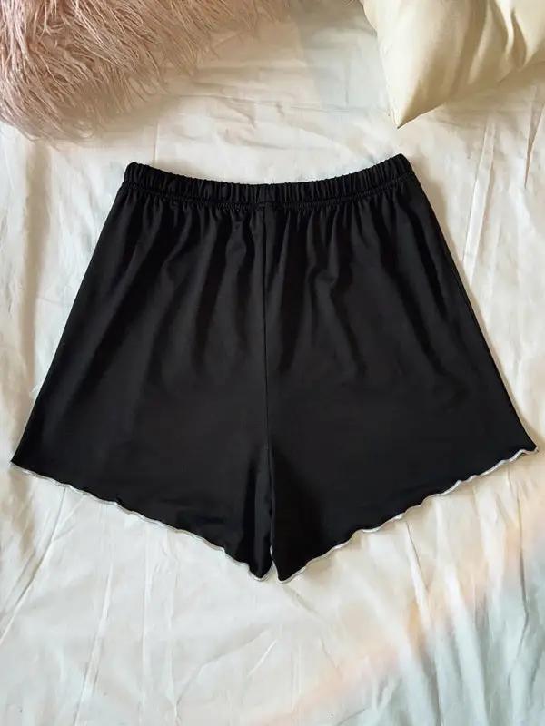 Back view of black knitted pajama shorts