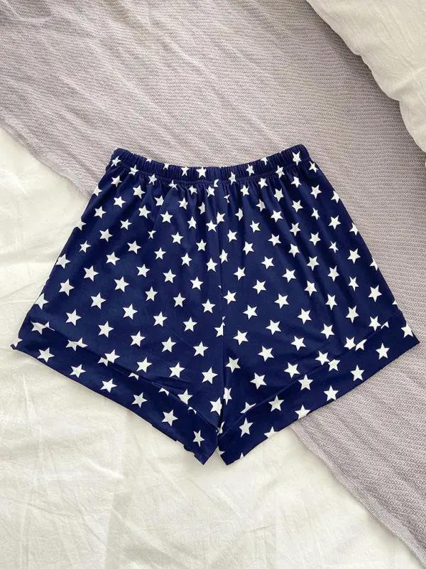Back view of star-patterned navy pajama shorts