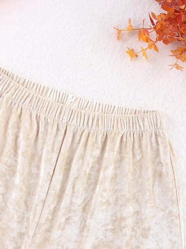 Close-up of beige velvet pajama trousers waistband