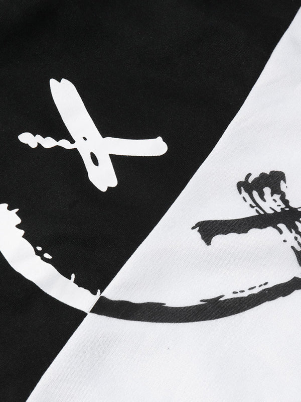 Close-up of black and white smiley design on sweatshirt