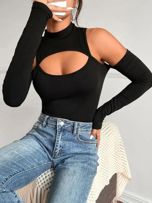 Chic black bodysuit paired with jeans, hollow front