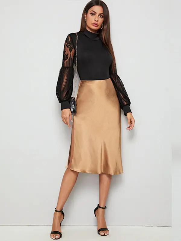 Full outfit with black lace bodysuit and gold skirt