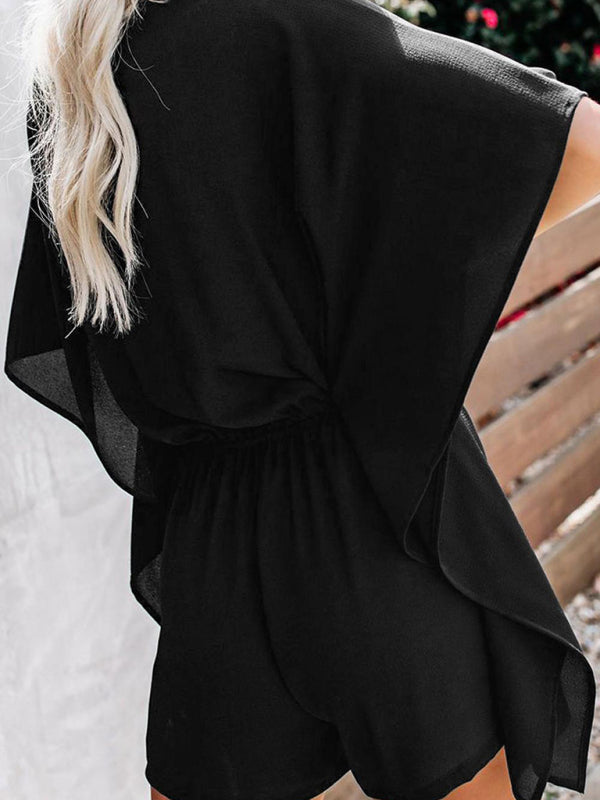 Close-up of black V-neck high waist jumpsuit