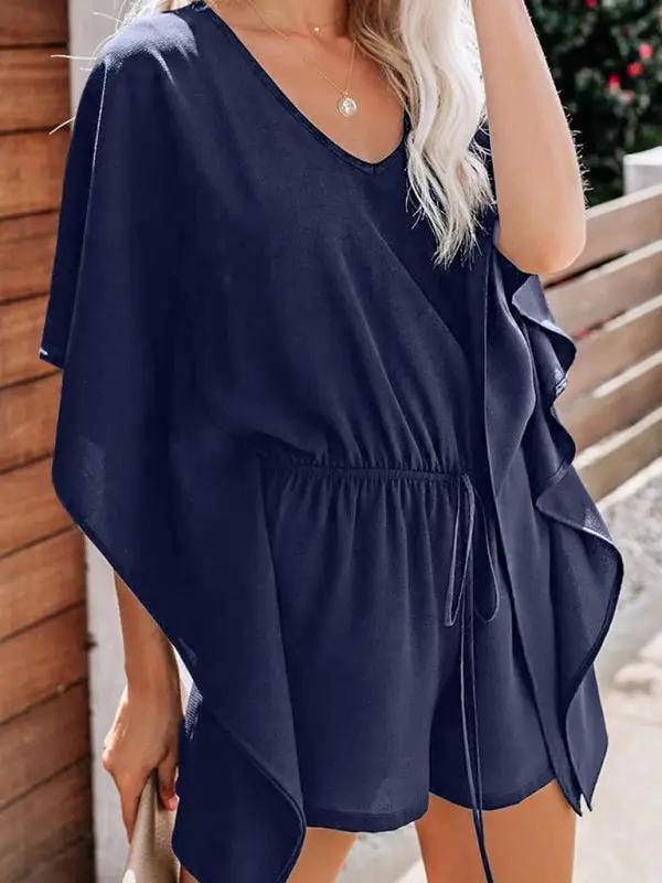 Side view of navy V-neck high waist jumpsuit