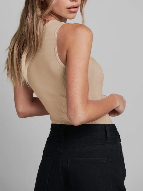 Back view of beige ribbed sleeveless jumpsuit