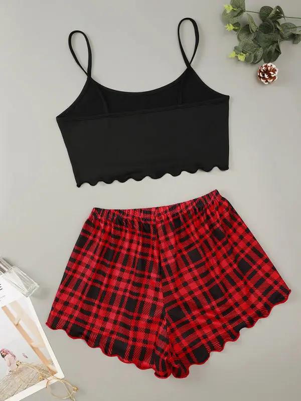 Back view of black camisole and red plaid shorts set