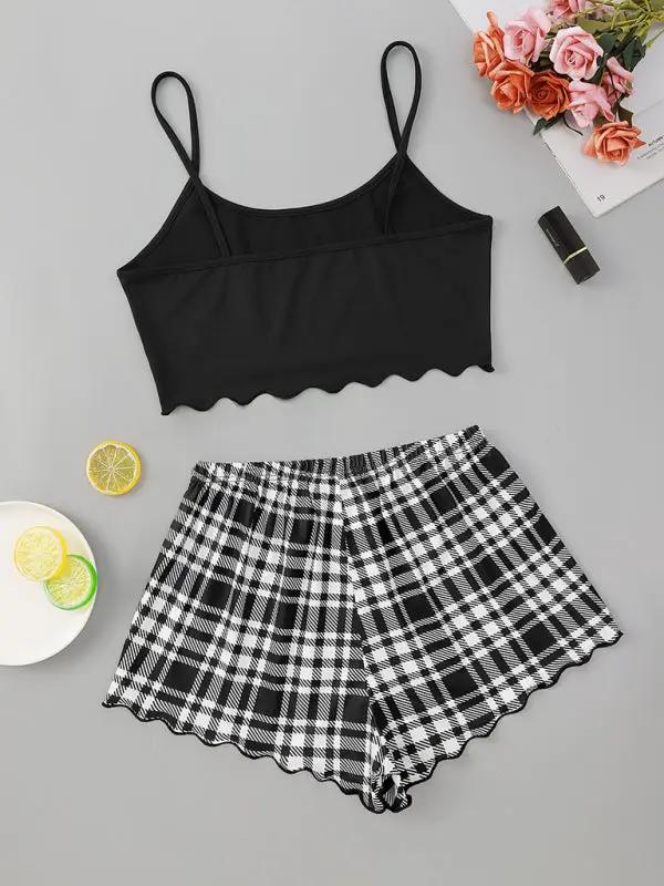 Back view of black camisole and black plaid shorts set