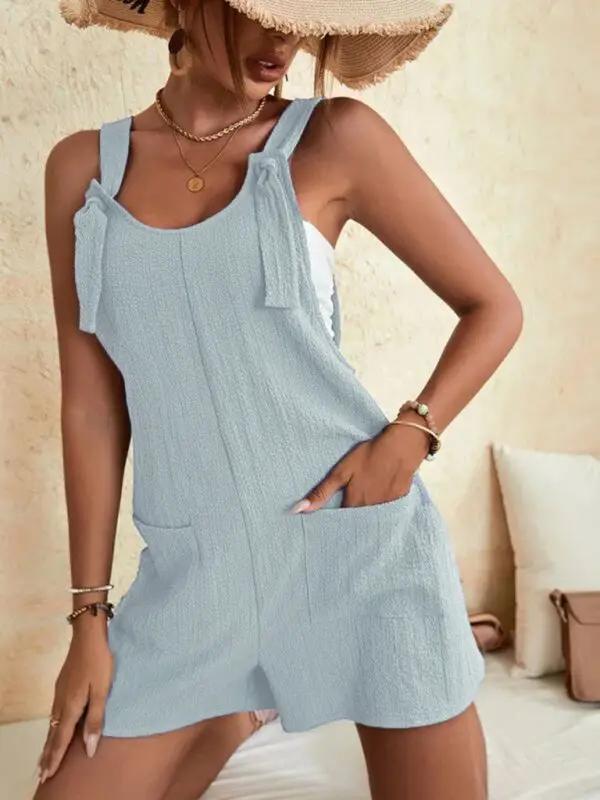 Blue casual overalls with patch pockets and lace-up detail
