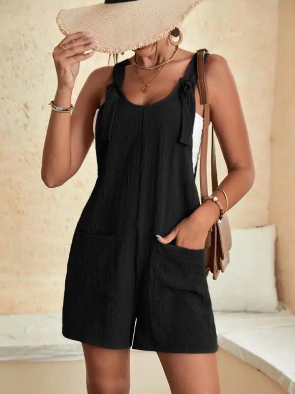 Black casual overalls with patch pockets and lace-up detail