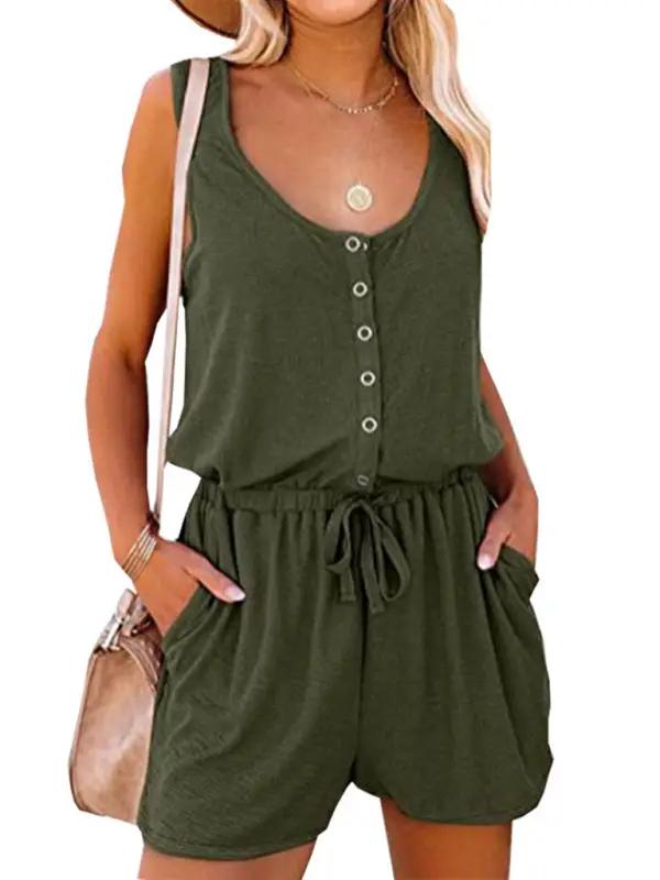 Front view sleeveless green jumpsuit with buttons and tie