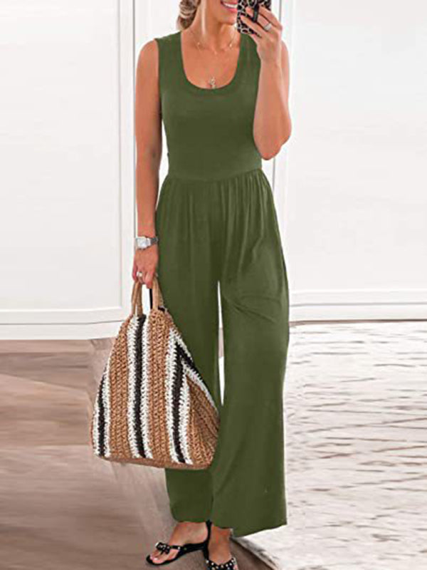 Green sleeveless loose jumpsuit with a woven bag