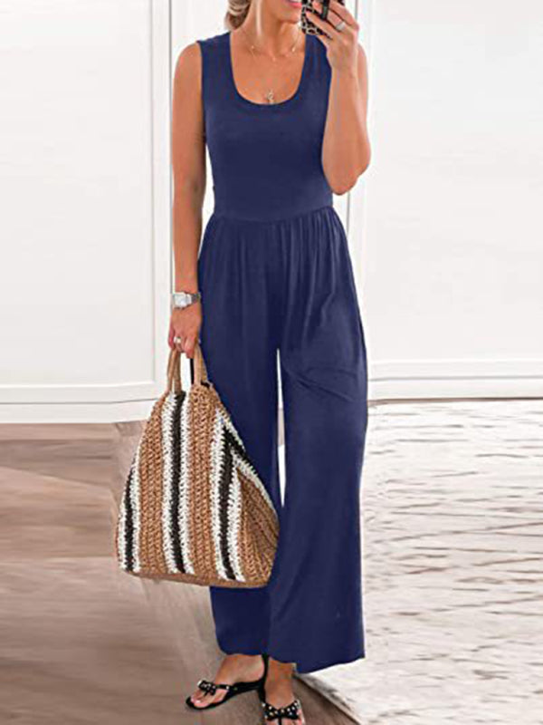 Blue sleeveless loose jumpsuit with a woven bag