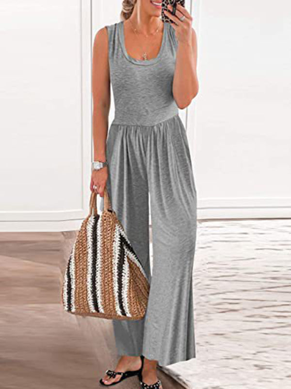 Gray sleeveless loose jumpsuit with a woven bag