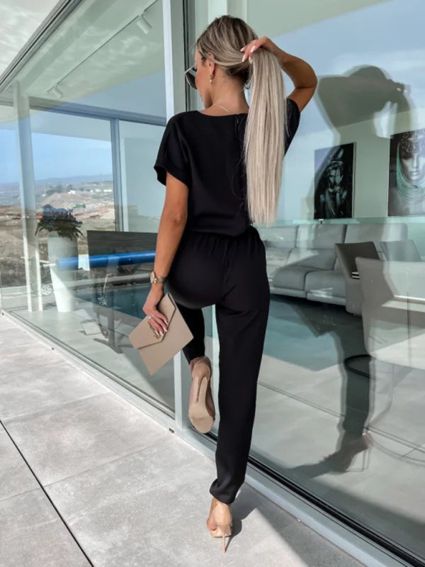 Close-up of black V-neck tie-up cropped jumpsuit