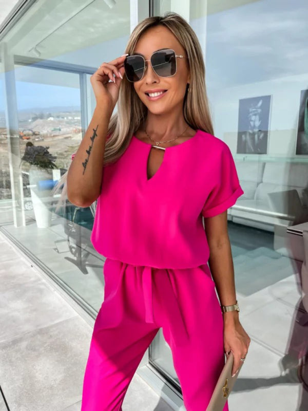 Bright pink V-neck tie-up cropped jumpsuit with pockets