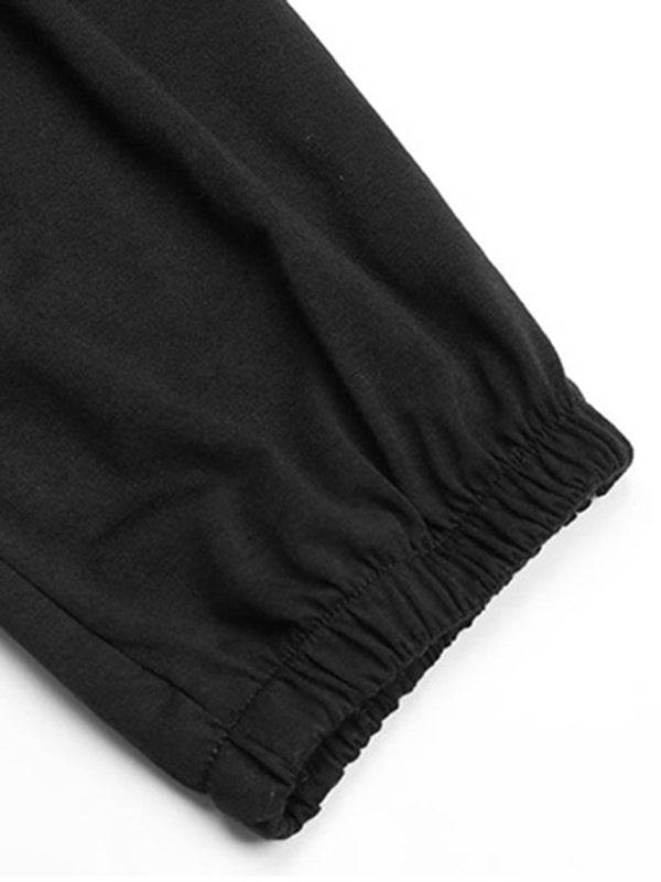 Elastic cuff detail on black jumpsuit