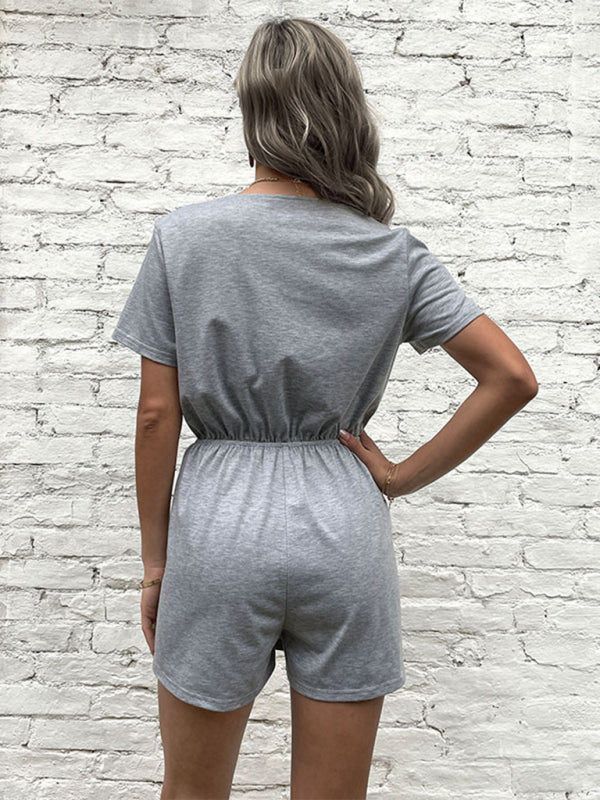 Back view of gray one-piece shorts with elastic waist