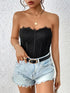 Elegant black lace strapless bodysuit with denim shorts