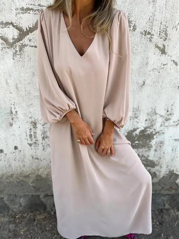 Beige V-neck lantern sleeve dress, seated view
