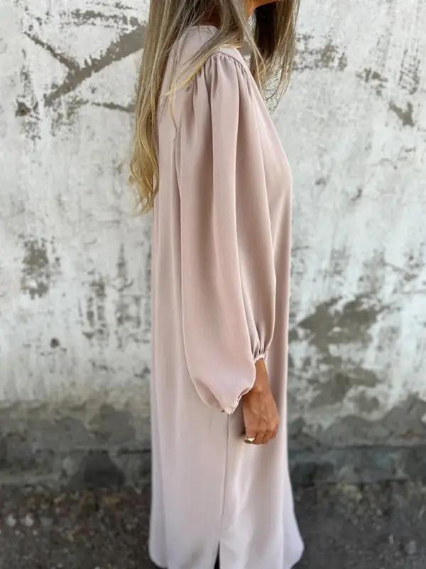 Beige V-neck lantern sleeve dress, side view
