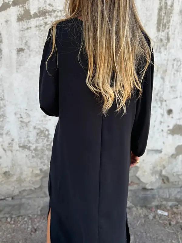 Black V-neck lantern sleeve dress, back view