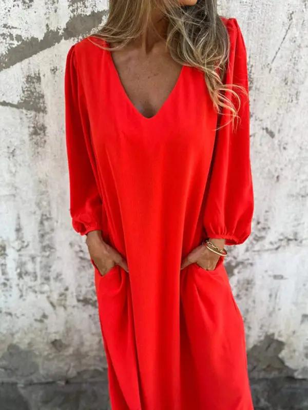 Red V-neck lantern sleeve dress, close-up