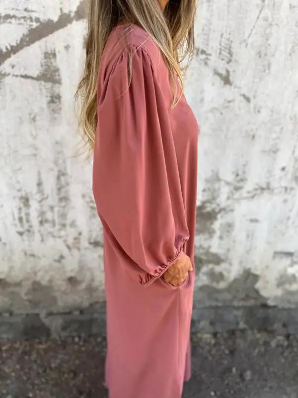 Pink V-neck lantern sleeve dress, side view
