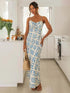 Blue floral slim-fit V-neck backless dress in kitchen