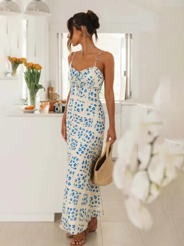 Side view of blue floral slim-fit V-neck dress