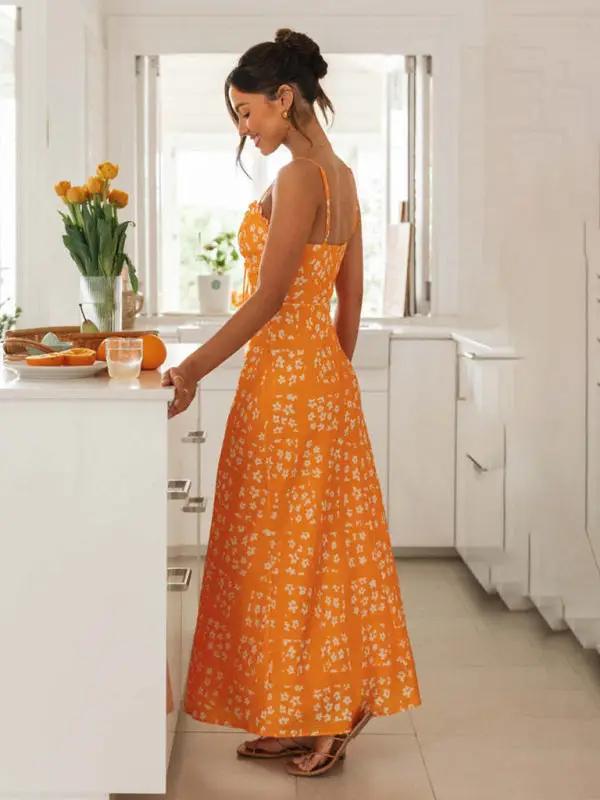 Side view of orange floral slim-fit V-neck dress