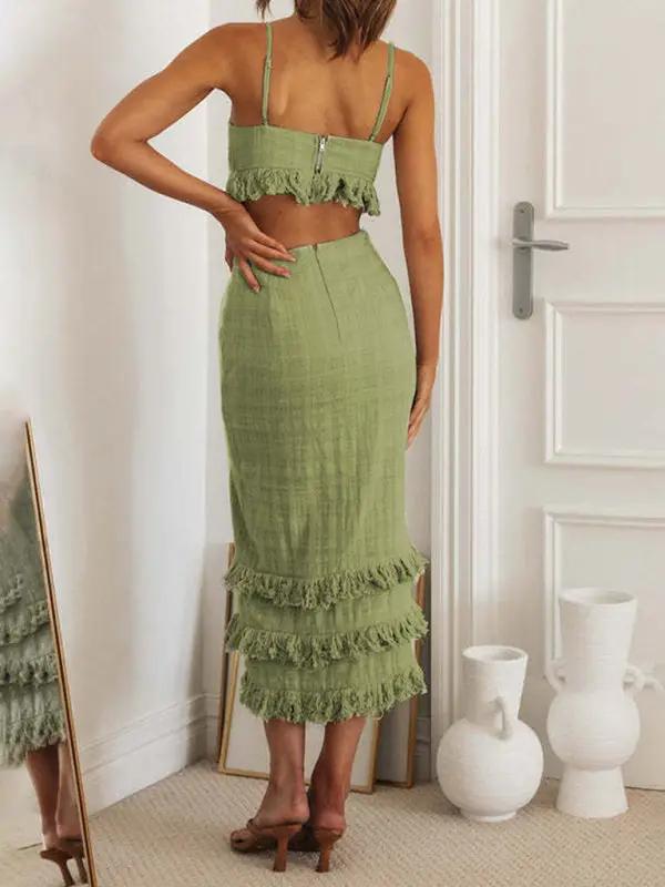Back view of green dress with fringe accents