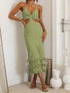 Green dress with fringe and cutout details