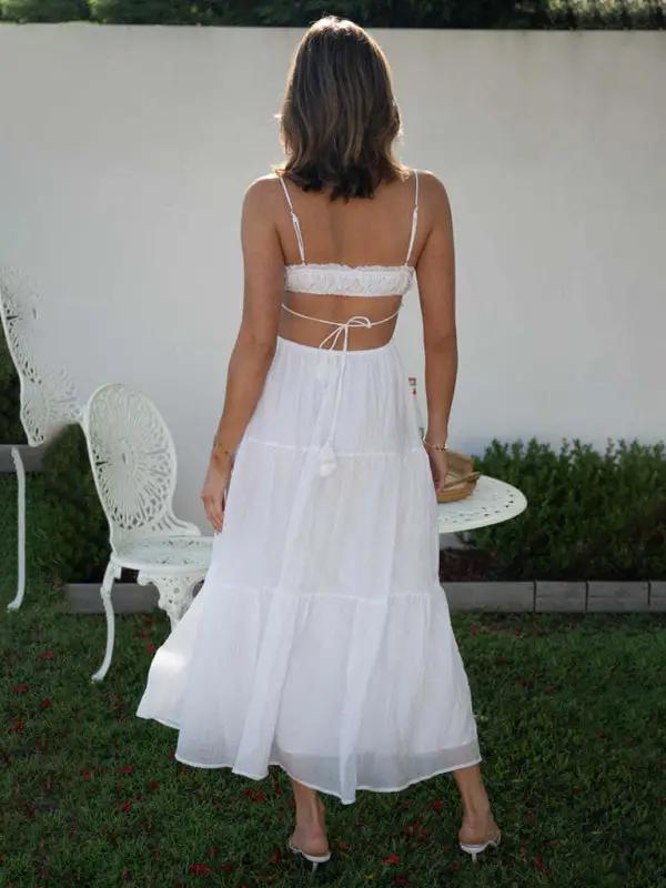 White sleeveless long dress with cutout details, back view