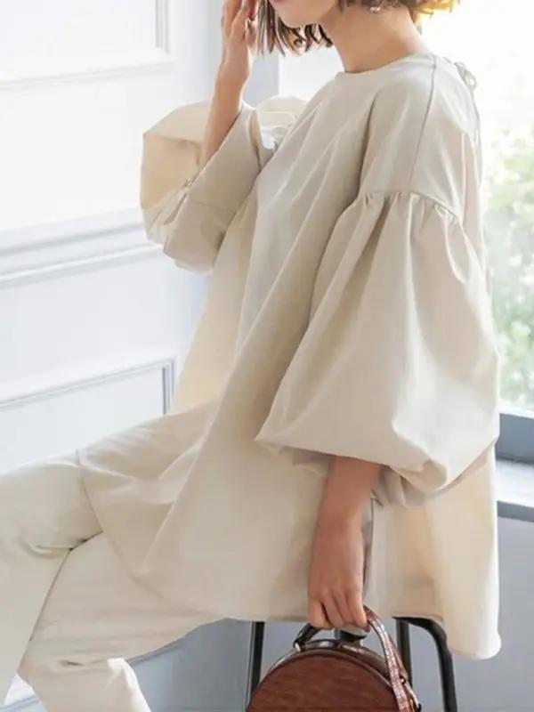 Beige lantern sleeve shirt side view